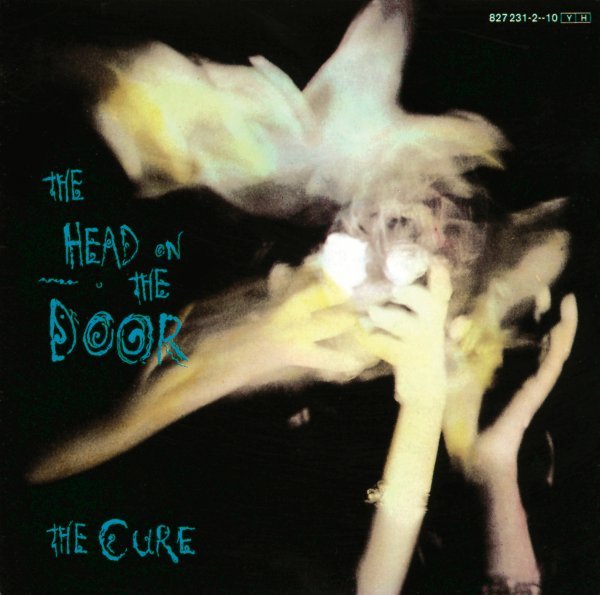 Cure (The) - The Head On The Door